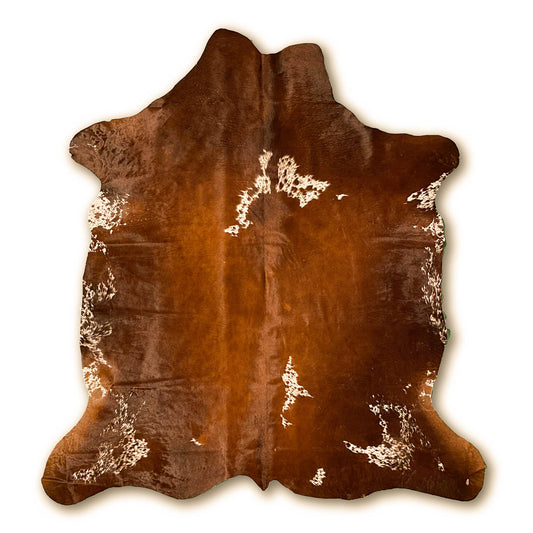 Brown and White Cowhide Rug