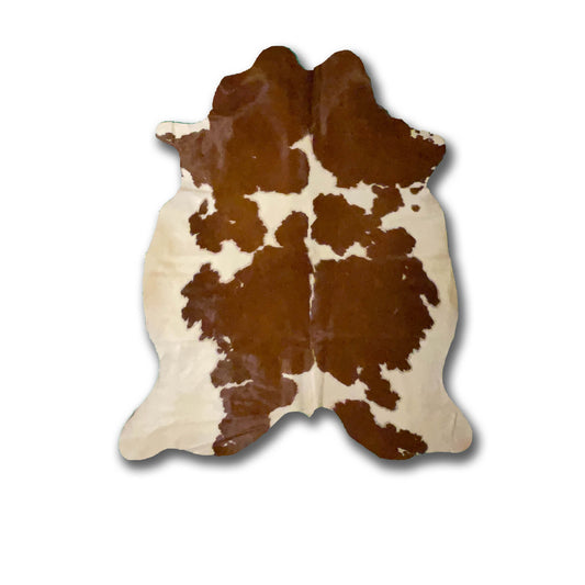 Brown and White Cowhide Rug