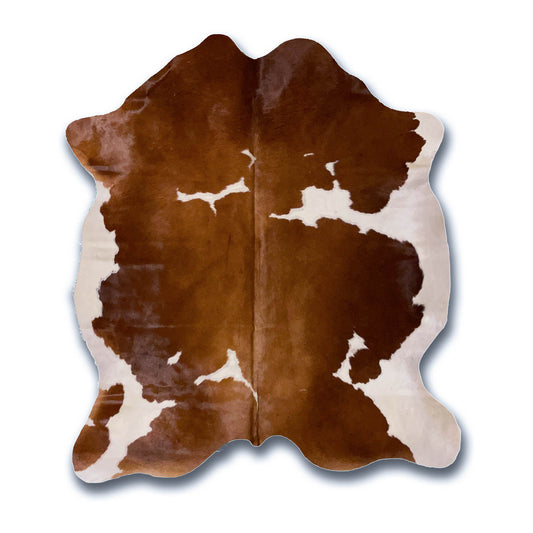 Brown and White Cowhide Rug