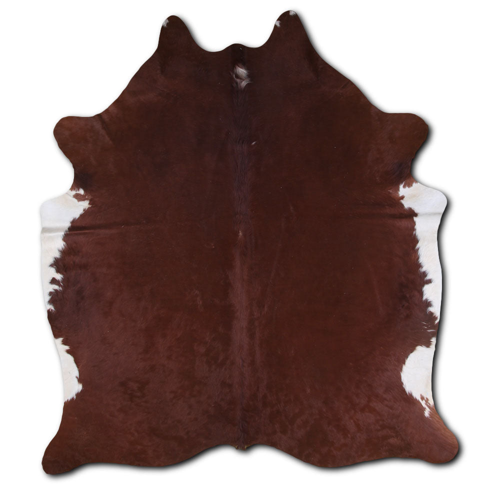 Brown and White Cowhide Rug