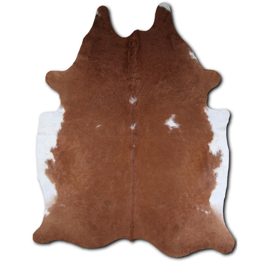 Brown and White Cowhide Rug